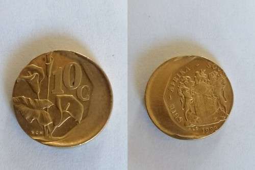 Off center strike error 1993 10 cent coin