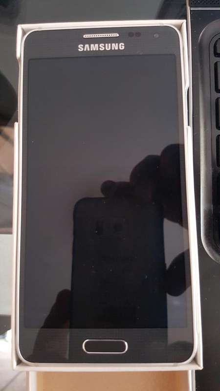Samsung  Alpha black plus samsung cover silver