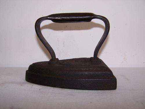 old sad iron ... great door-stop !!!