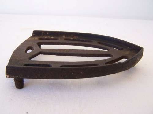 cast iron stand ... for your sad little iron !!!