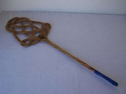 carpet beater ... gotta love them !!!