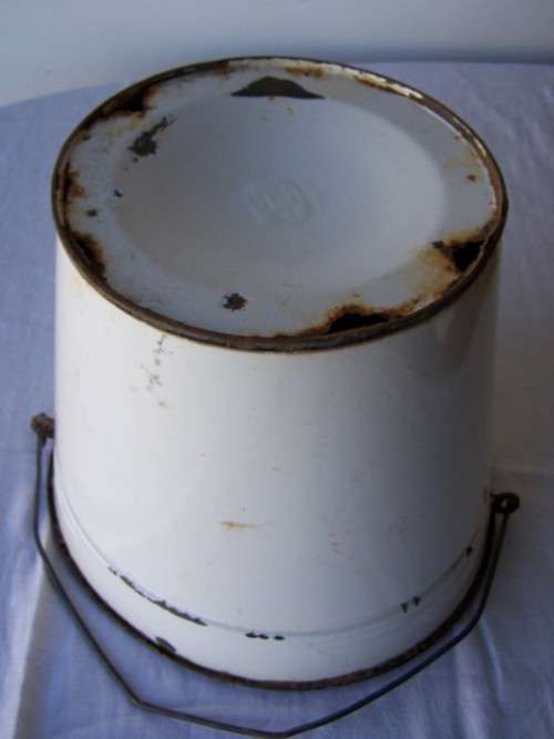 bucket ...  holey moley herb planter !!!