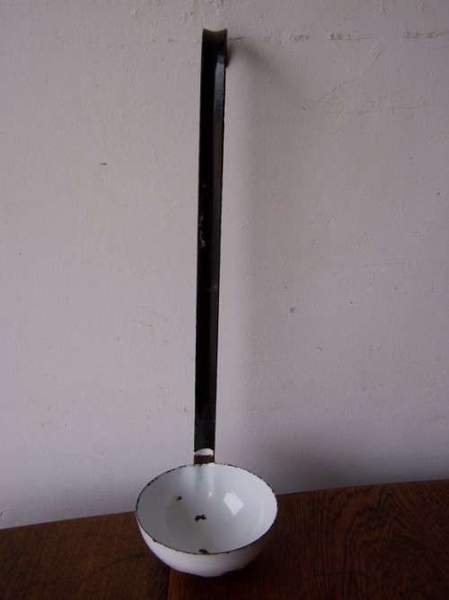 ladle ...  a heavy white one !!!