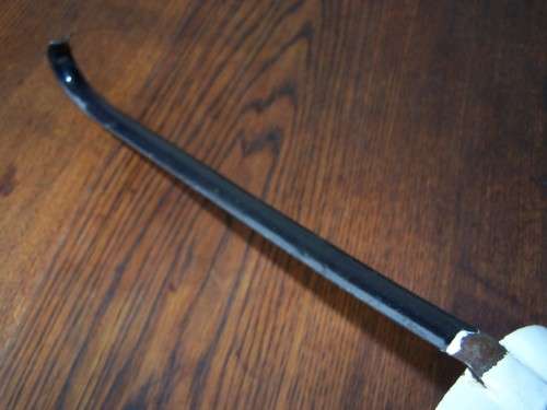 ladle ...  a heavy white one !!!