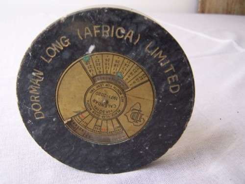 interesting paper weight ...  1971 - 2020(who will forget?) perpetual calendar !!!