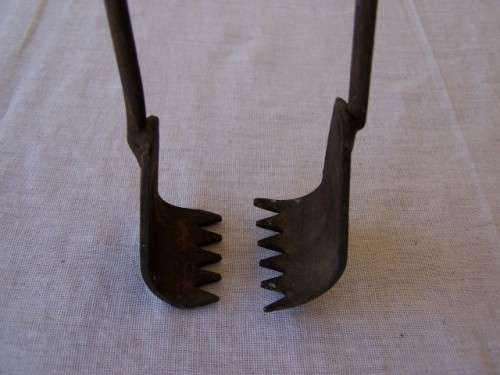tongs ...  for grabbing coals !!!