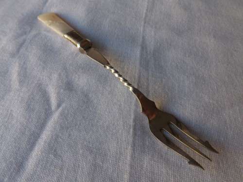 pickle fork ... with a mother of pearl handle !!!