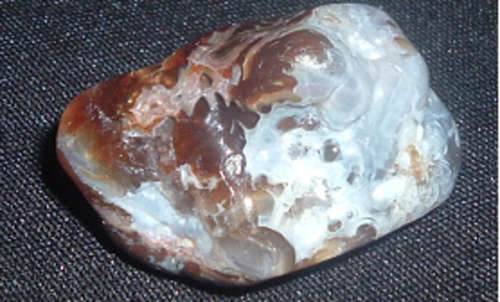 Fire Agate (rare) deflecting ill-wishing and harm and reflecting it back to its source present abso