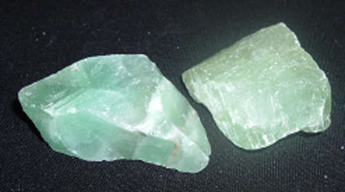 Rough green calcite draws money and prosperity