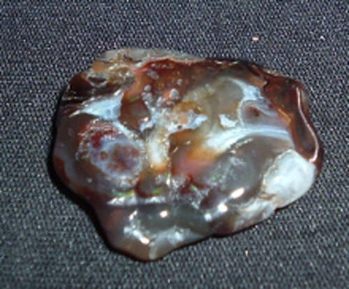 Fire Agate (rare) deflecting ill-wishing and harm and reflecting it back to its source present abso
