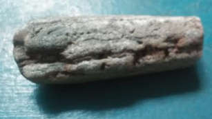 Rough Chiastolite, also known as Cross Stone, is a very rare variety of Andalusite