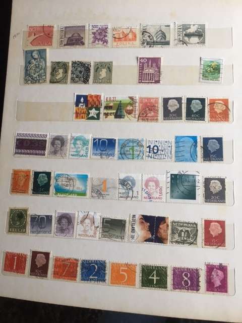Stamp album with approx 800 stamps.