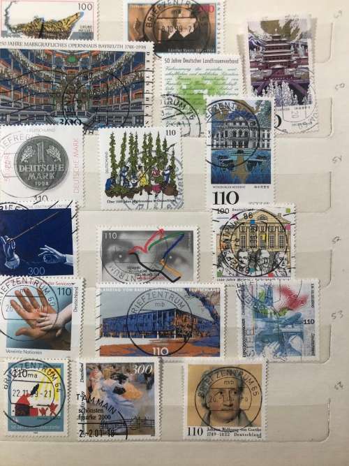 Germany 1990 - 1999 used stamps in A5 album (150+ stamps)