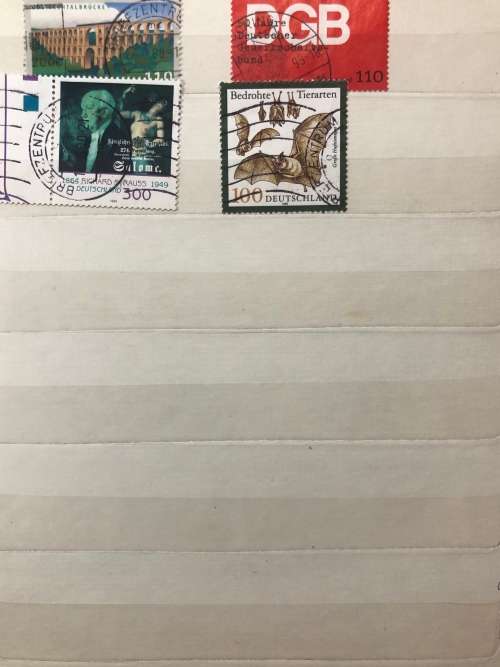 Germany 1990 - 1999 used stamps in A5 album (150+ stamps)