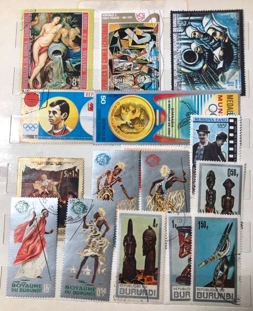 African stamps in album,
