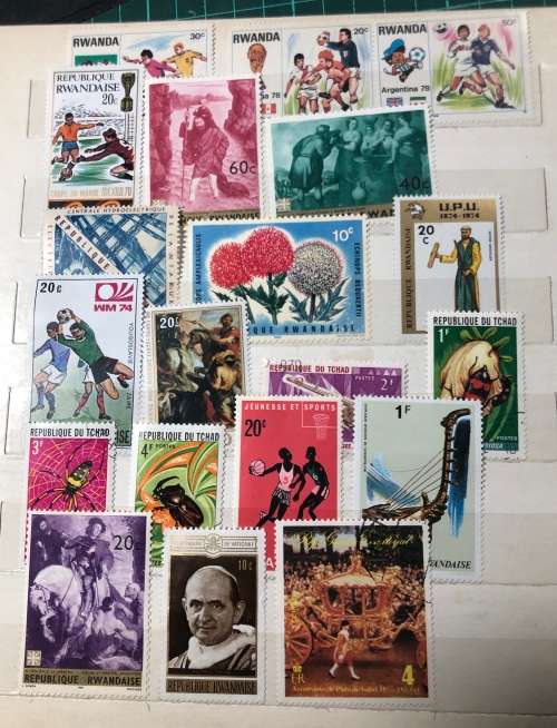 African stamps in album,