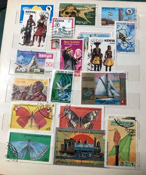 African stamps in album,