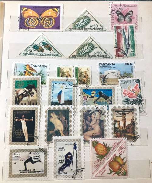 African stamps in album,