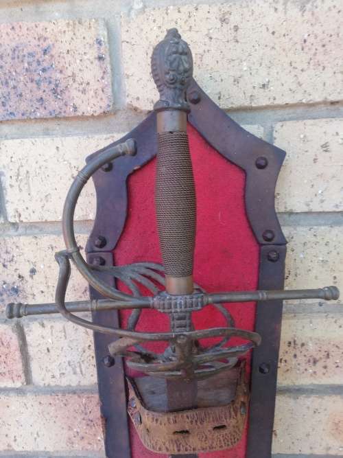 Replica Spanish sword with wall hanging