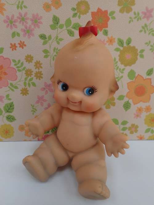Kewpie Doll Sitting Posture