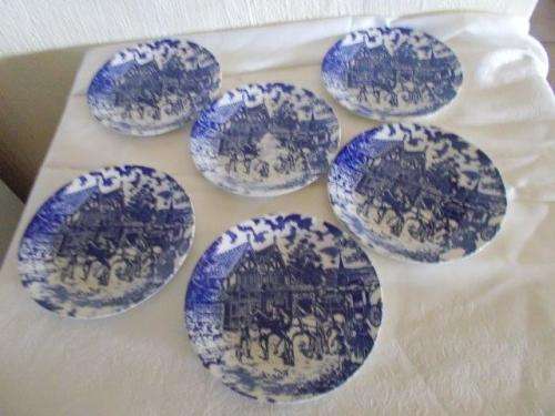 A set of six blue and white horse scenes side plates