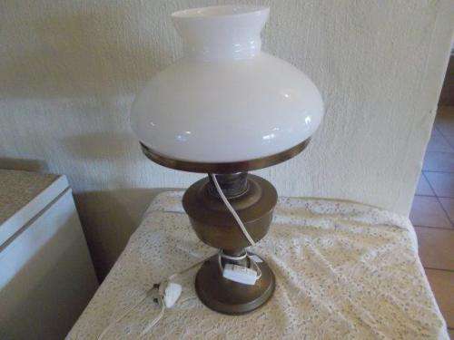Vintage style brass looking lamp with glass shade