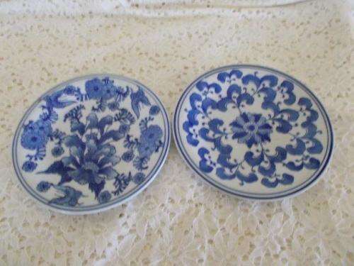 Two lovely blue and white oriental style wall plates