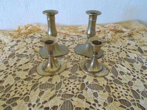 Two pairs of brass candle holders