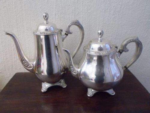 A pair of vintage silver plated tea and coffee pots