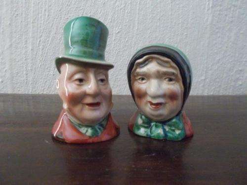 A pair of character beswick salt and pepper set