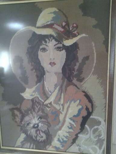 stunning large framed tapestry of a lady with a Yorkie? dog behind glass