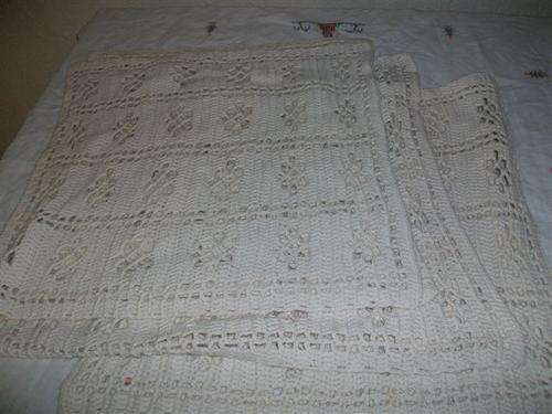 Set of five woolen crochet mats