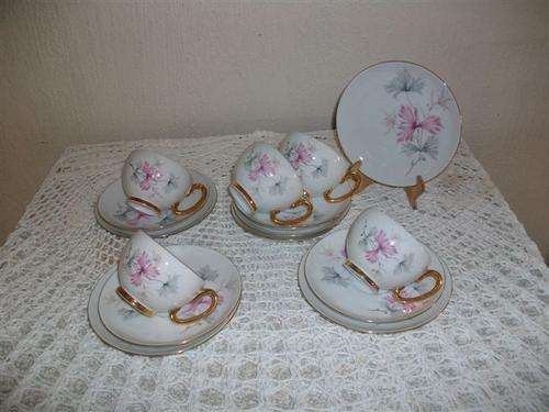 Pretty set of five troi's tea cups set