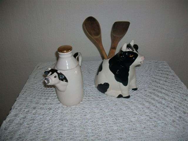 Interesting cow milk jug and cow utensil holder