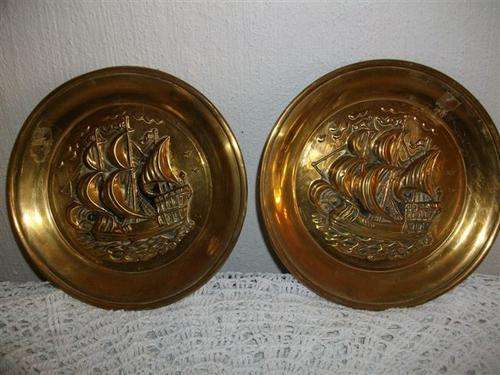 Two lovely brass wall plates