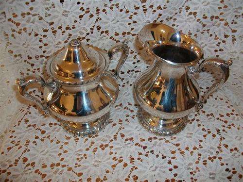 Lovely silver plated milk and sugar basin set