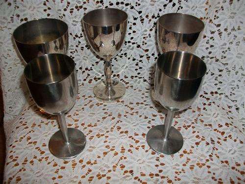 Some sliver plated and two stainless steel goblets for the collector