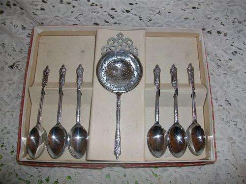 boxed sliver chrome plated  apostle tea spoons and tea strainer set