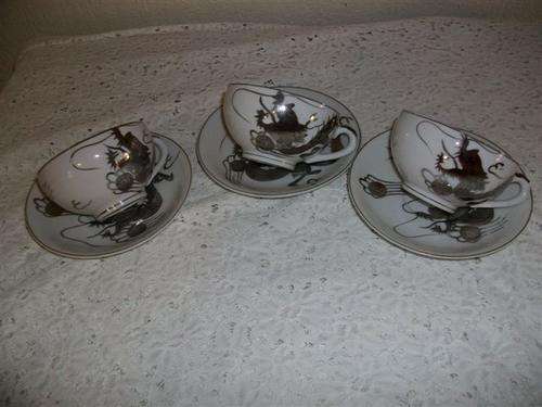 Three lovely japanese tea cups and saucers