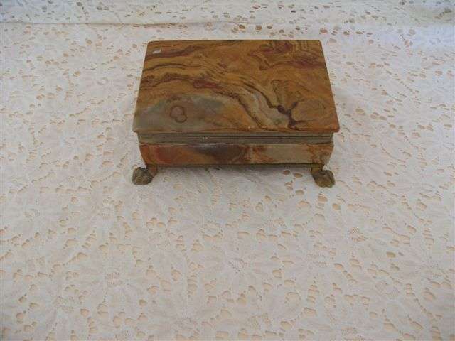 Great stone trinket box with brass claw feet