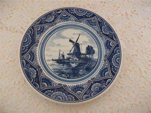 Lovely medium sized blue delft plate with a windmill scence