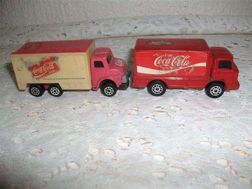 Two collectable coke trucks