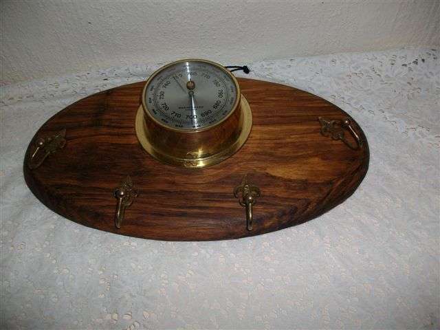 vintage wooden hat holder with thermometer