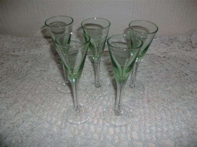 Set of five green coloured glass long steam tot glasses