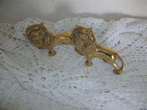 A pair of soild brass lions
