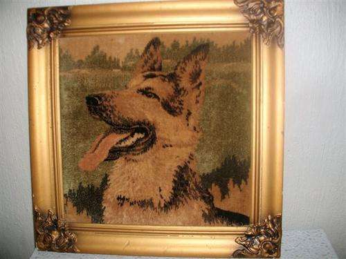 Ornate frame with dog carpet tapestry