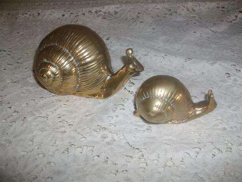 A pair of lovely soild brass snails