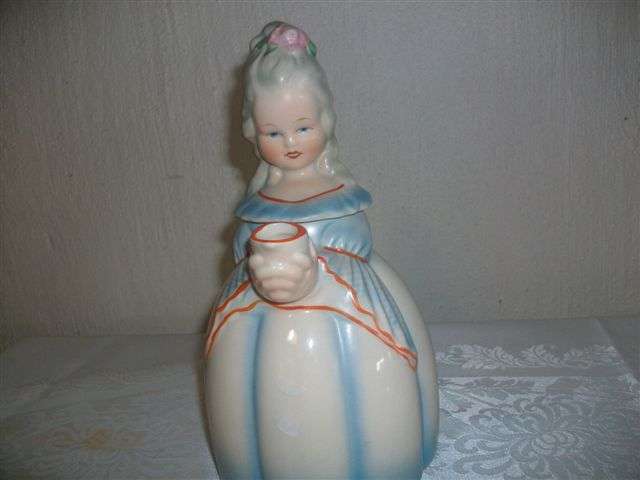 Lovely collectable tea pot in form of a lady