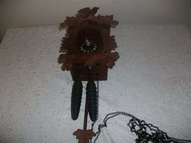 small cuckoo wall , will sold as is (not working)