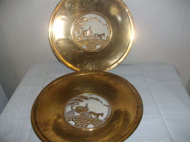 Two lovely brass plated wall plates